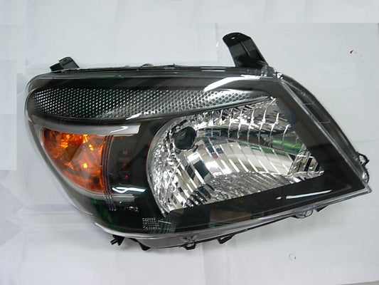 💡 Faro delantero — FORD RANGER (desde 2009) — Faro con regulación manual/eléctrica interior, acabado negro