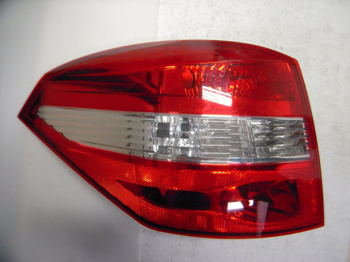 Piloto trasero (familiar) — RENAULT LAGUNA (desde 2008) — izquierdo