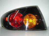 Piloto trasero — MAZDA 3 SEDAN (2004–2007) — izquierdo