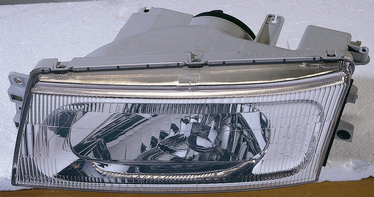 Faro para MITSUBISHI LANCER (desde 1998) — Izquierdo
